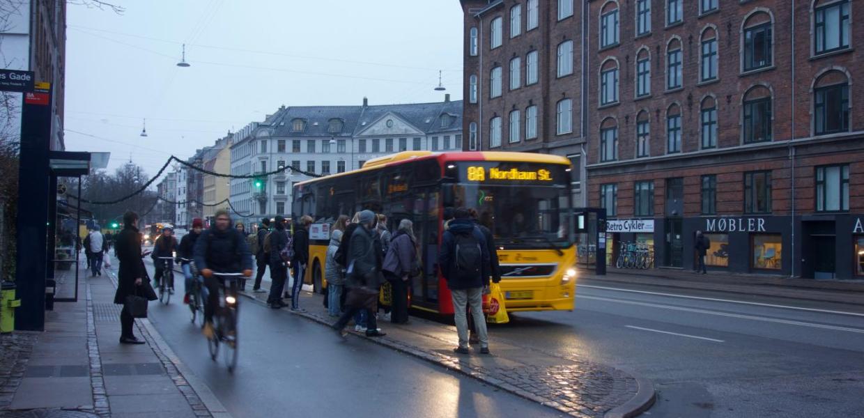 With a simple island, both bus passengers and cyclists can safely navigate an otherwise tricky situation.